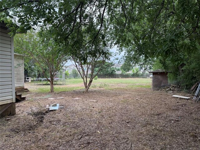 2505 Gardenia Dr, Austin, TX 78727 - view of yard featuring a trampoline