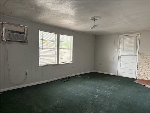 2505 Gardenia Dr, Austin, TX 78727 - empty room featuring a textured ceiling, baseboards, and carpet floors