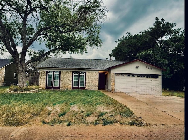 6400 Earlyway Dr, Austin, TX 78749 - single story home with an attached garage, stone siding, concrete driveway, and a front lawn