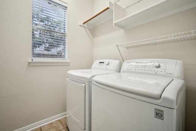 5616 Gorham Glen Ln, Austin, TX 78739 - laundry room featuring separate washer and dryer and baseboards