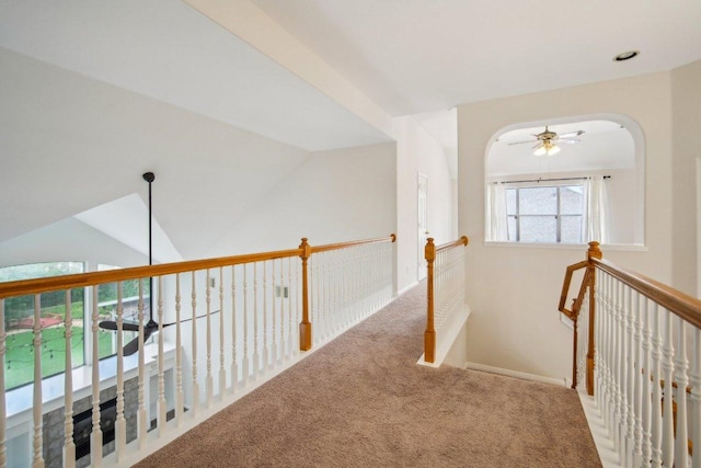 5616 Gorham Glen Ln, Austin, TX 78739 - hallway with carpet flooring, an upstairs landing, and arched walkways