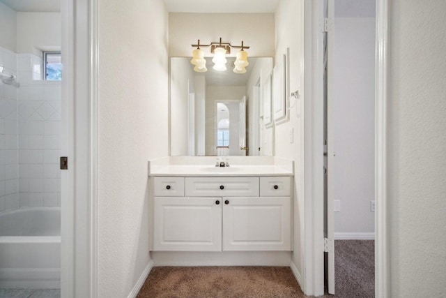 5616 Gorham Glen Ln, Austin, TX 78739 - bathroom with vanity, a chandelier, and tub / shower combination