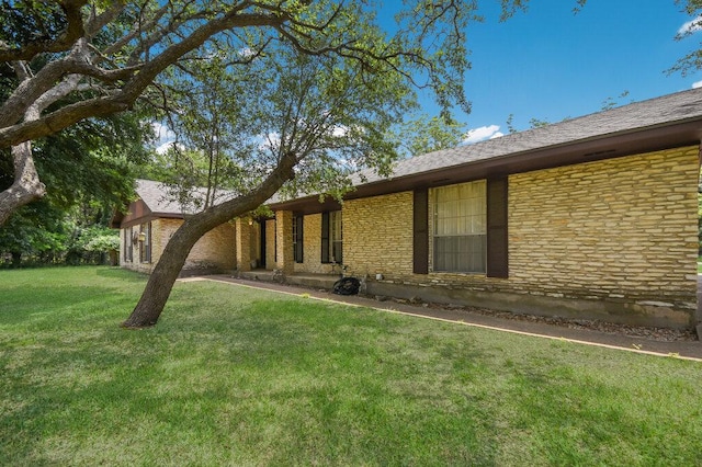 301 Navajo Trl, Georgetown, TX 78633 - view of front of property with a front yard and stone siding