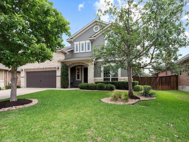 116 Claiborne Lake Ln, Georgetown, TX 78628 - traditional-style home with stone siding, stucco siding, concrete driveway, and a garage