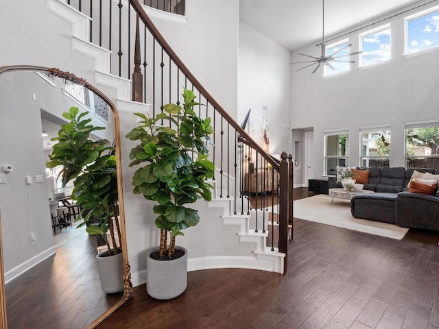 116 Claiborne Lake Ln, Georgetown, TX 78628 - entrance foyer with a ceiling fan, a towering ceiling, wood finished floors, and stairs