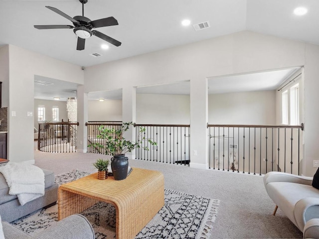 116 Claiborne Lake Ln, Georgetown, TX 78628 - carpeted living room featuring ceiling fan, healthy amount of natural light, vaulted ceiling, and recessed lighting