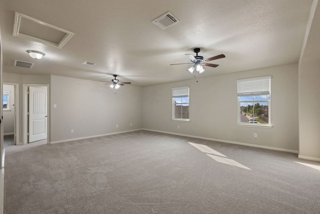 854 Pumpkin Rdg, New Braunfels, TX 78130 - carpeted empty room featuring ceiling fan, baseboards, and attic access