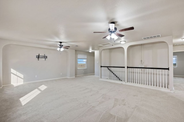 854 Pumpkin Rdg, New Braunfels, TX 78130 - unfurnished living room with ceiling fan, carpet flooring, and baseboards