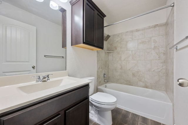 854 Pumpkin Rdg, New Braunfels, TX 78130 - bathroom featuring toilet, wood finished floors, vanity, and washtub / shower combination