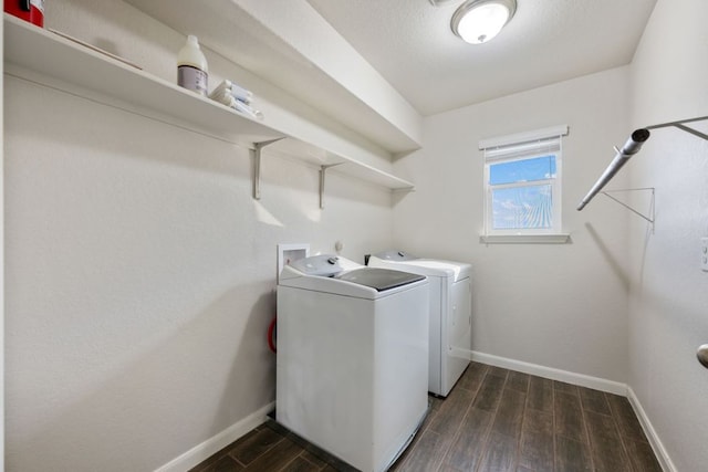 854 Pumpkin Rdg, New Braunfels, TX 78130 - laundry area featuring separate washer and dryer, baseboards, and dark wood-style floors