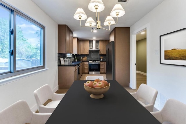7702 Turquoise Trl, Austin, TX 78749 - dining area with a chandelier and recessed lighting