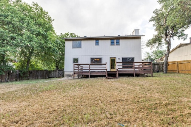 7702 Turquoise Trl, Austin, TX 78749 - rear view of property featuring a deck and a chimney