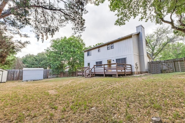 7702 Turquoise Trl, Austin, TX 78749 - rear view of house with a deck and a chimney