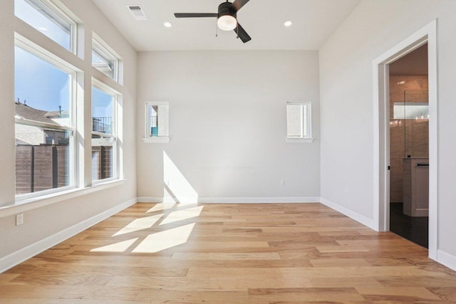 16825 Roselin Dr, Austin, TX 78738 - spare room with light wood-style floors, ceiling fan, baseboards, and recessed lighting