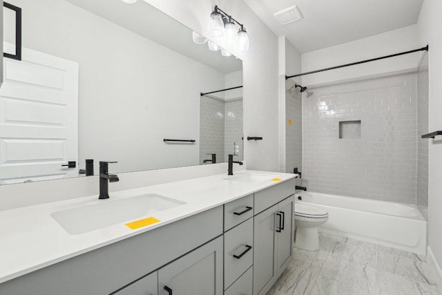 16825 Roselin Dr, Austin, TX 78738 - full bathroom with double vanity, bathing tub / shower combination, marble look tile flooring, and toilet