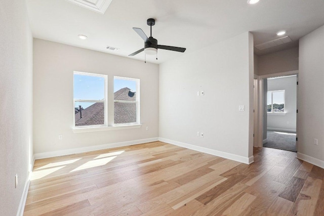 16825 Roselin Dr, Austin, TX 78738 - spare room with healthy amount of natural light, light wood-style floors, recessed lighting, ceiling fan, and baseboards