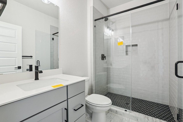 16825 Roselin Dr, Austin, TX 78738 - bathroom with vanity, a stall shower, and toilet