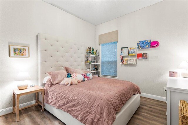 1504 Saddlespur Ln, Leander, TX 78641 - bedroom featuring wood finished floors