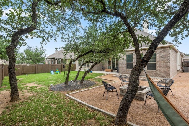 1504 Saddlespur Ln, Leander, TX 78641 - view of yard featuring cooling unit and a patio area