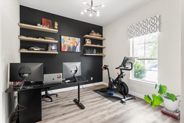 1504 Saddlespur Ln, Leander, TX 78641 - office featuring a chandelier and wood finished floors
