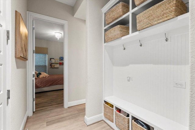 1504 Saddlespur Ln, Leander, TX 78641 - mudroom featuring light wood-type flooring and baseboards