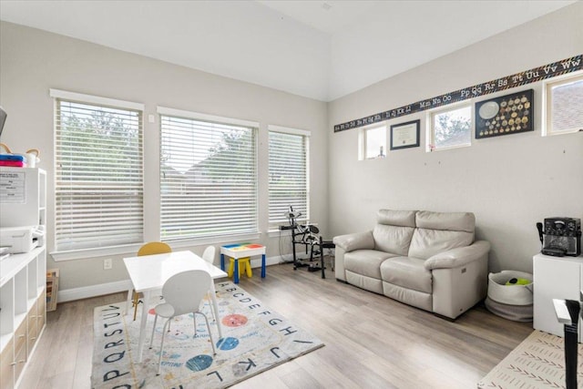 1504 Saddlespur Ln, Leander, TX 78641 - rec room featuring light wood finished floors and baseboards