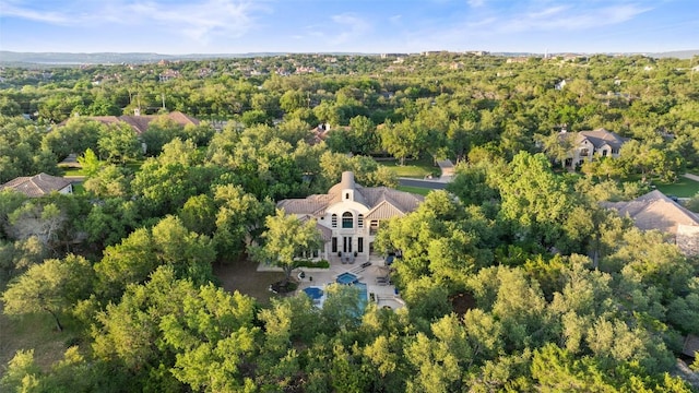104 Sendera Bonita, Lakeway, TX 78734 - aerial view of property and surrounding area with a forest