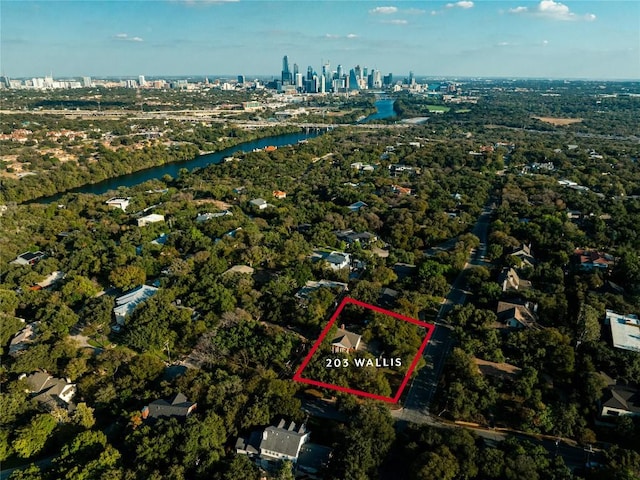 203 Wallis Dr, Austin, TX 78746 - view of property location featuring a large body of water, property boundaries highlighted, and skyline