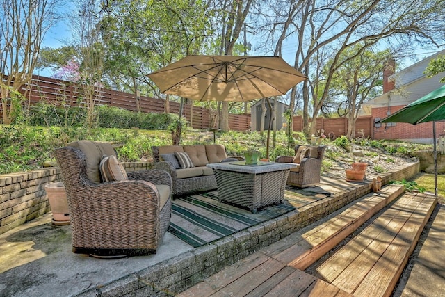 2804 Rock Way, Austin, TX 78746 - wooden deck featuring an outdoor hangout area, a fenced backyard, and a patio area