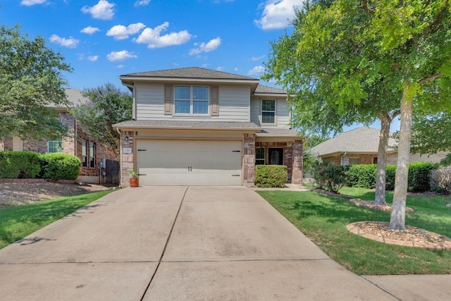 116 Bufflehead, Leander, TX 78641 - traditional home featuring a garage, driveway, a front lawn, and brick siding