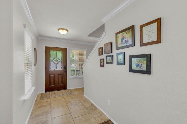 116 Bufflehead, Leander, TX 78641 - foyer featuring crown molding and baseboards