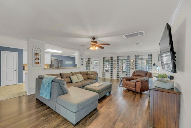 116 Bufflehead, Leander, TX 78641 - living room featuring crown molding, ceiling fan, and wood finished floors