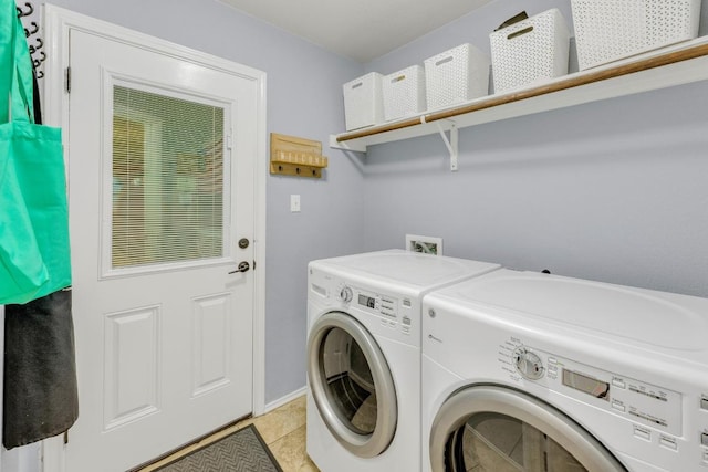 116 Bufflehead, Leander, TX 78641 - washroom with washer and clothes dryer and light tile patterned floors