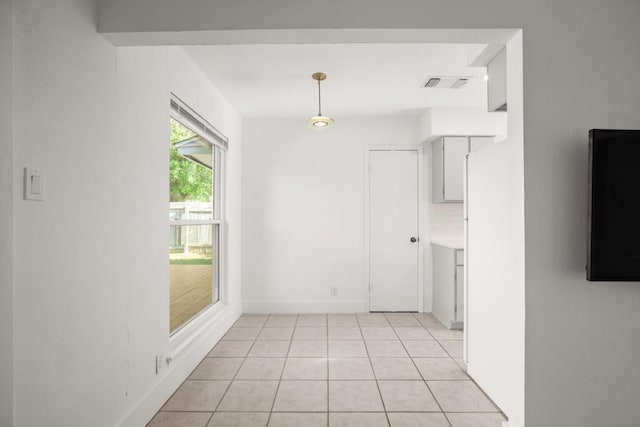 5706 Cherry Park, Austin, TX 78745 - empty room with light tile patterned flooring and baseboards