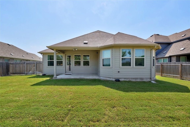 108 Windgate Dr, Hutto, TX 78634 - back of property with a patio and a fenced backyard