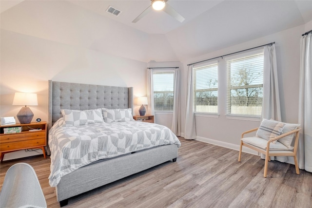 108 Windgate Dr, Hutto, TX 78634 - bedroom featuring light wood-style floors, vaulted ceiling, and ceiling fan