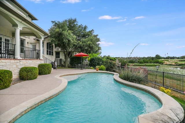 10524 Roy Butler Dr, Austin, TX 78717 - view of swimming pool featuring a fenced backyard and a patio area