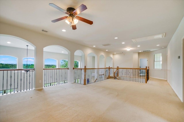 10524 Roy Butler Dr, Austin, TX 78717 - carpeted empty room with a ceiling fan, recessed lighting, and baseboards
