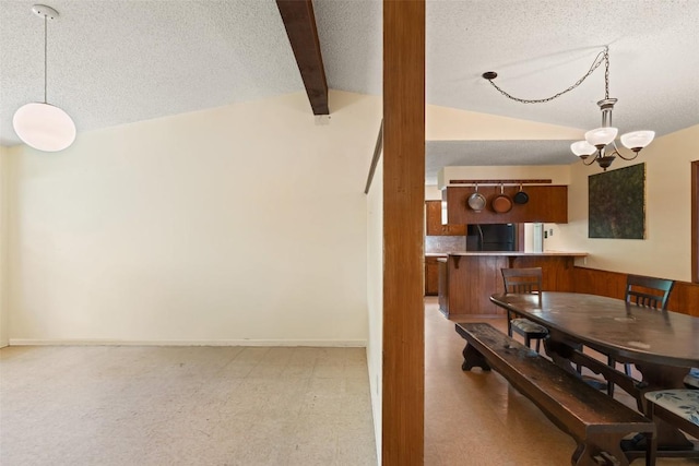 1012 Chesapeake Dr, Austin, TX 78758 - dining space featuring a textured ceiling, a chandelier, and light floors