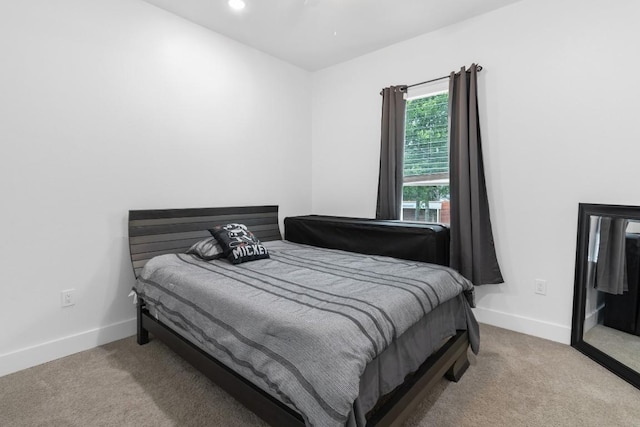 123 Zacate St, Elgin, TX 78621 - carpeted bedroom with baseboards