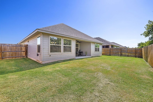 107 Nathaniel Dr, Taylor, TX 76574 - rear view of house with a ceiling fan, a patio, and roof with shingles