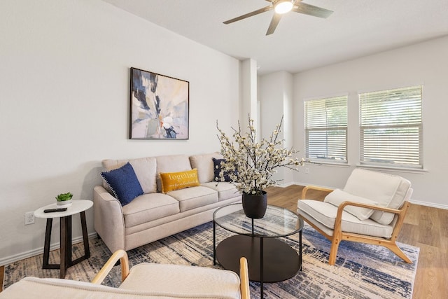 107 Nathaniel Dr, Taylor, TX 76574 - living area with ceiling fan, wood finished floors, and baseboards