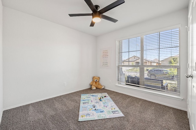 107 Nathaniel Dr, Taylor, TX 76574 - spare room with carpet floors, a ceiling fan, and baseboards