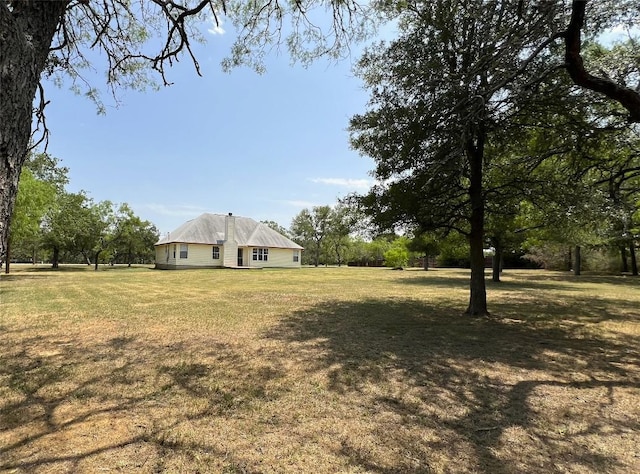 122 Deep Woods Ct, Cedar Creek, TX 78612 - view of grassy yard