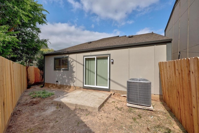 5225 Langwood Dr, Austin, TX 78754 - rear view of house with cooling unit and a fenced backyard