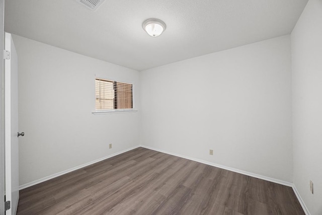 5225 Langwood Dr, Austin, TX 78754 - unfurnished room with wood finished floors and baseboards