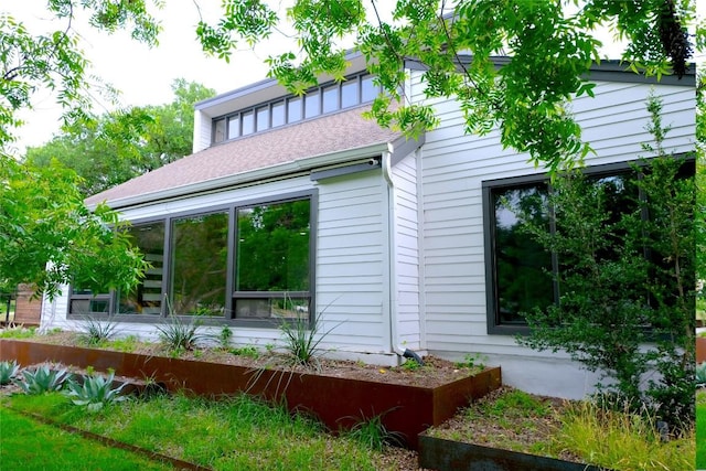 808 Vanguard St, Austin, TX 78734 - view of property exterior with a shingled roof