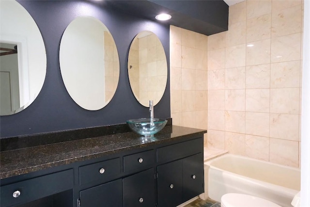808 Vanguard St, Austin, TX 78734 - full bath featuring vanity, toilet, and washtub / shower combination