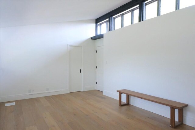 808 Vanguard St, Lakeway, TX 78734 - spare room with light wood-style floors and baseboards