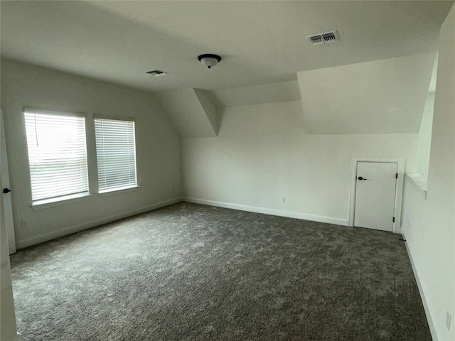 245 Darley Oak Dr, Dripping Springs, TX 78620 - bonus room with carpet flooring, vaulted ceiling, and baseboards